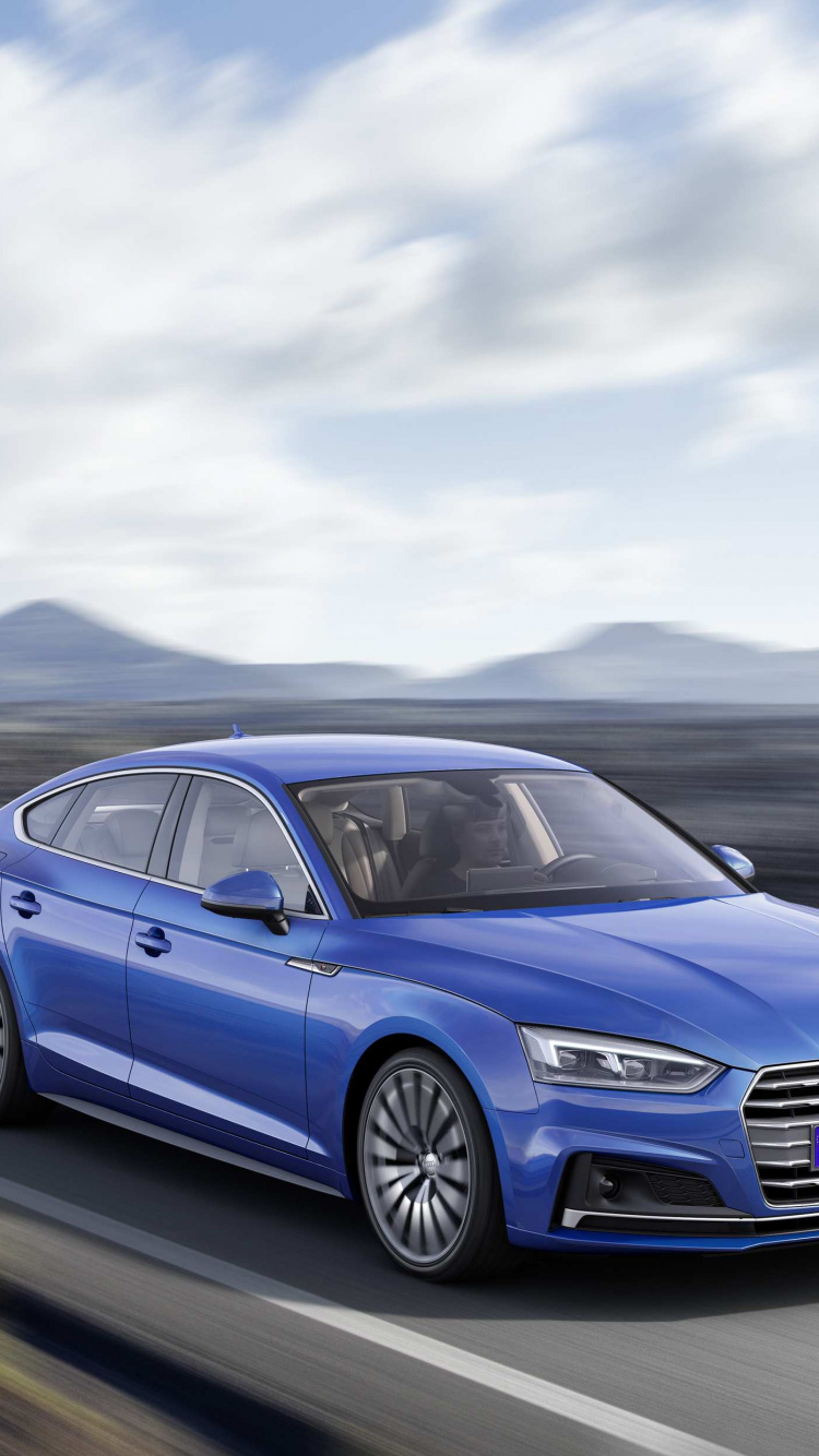 Blauer Audi a 4 Tagsüber Unterwegs. Wallpaper in 750x1334 Resolution