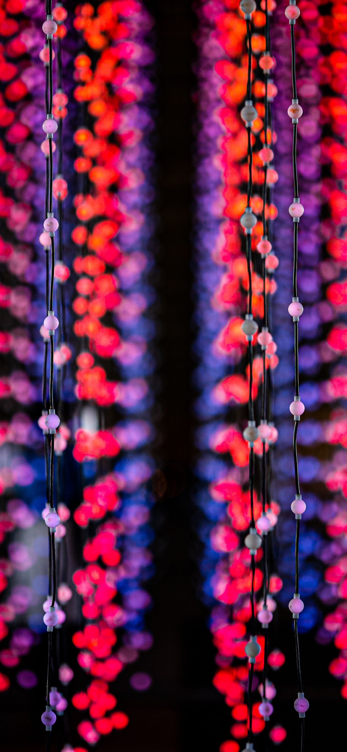 Luces de Cadena Rojas y Amarillas. Wallpaper in 1125x2436 Resolution