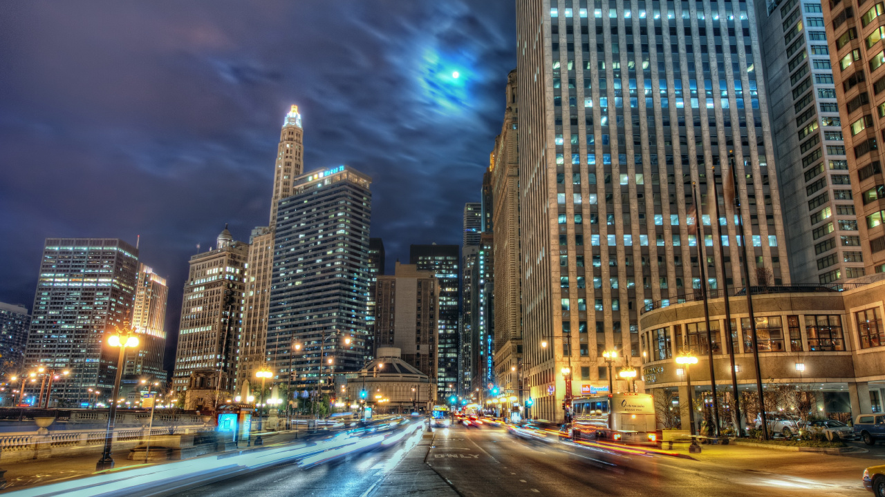 Cars on Road Near High Rise Buildings During Night Time. Wallpaper in 1280x720 Resolution