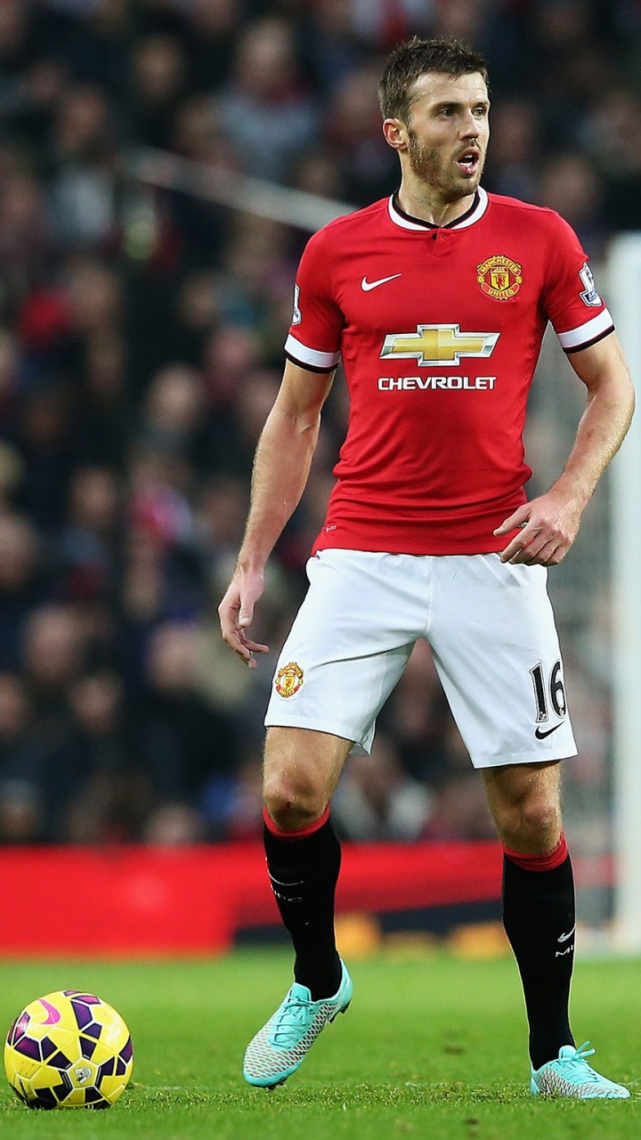 Man in Red Nike Soccer Jersey Shirt and White Shorts. Wallpaper in 720x1280 Resolution