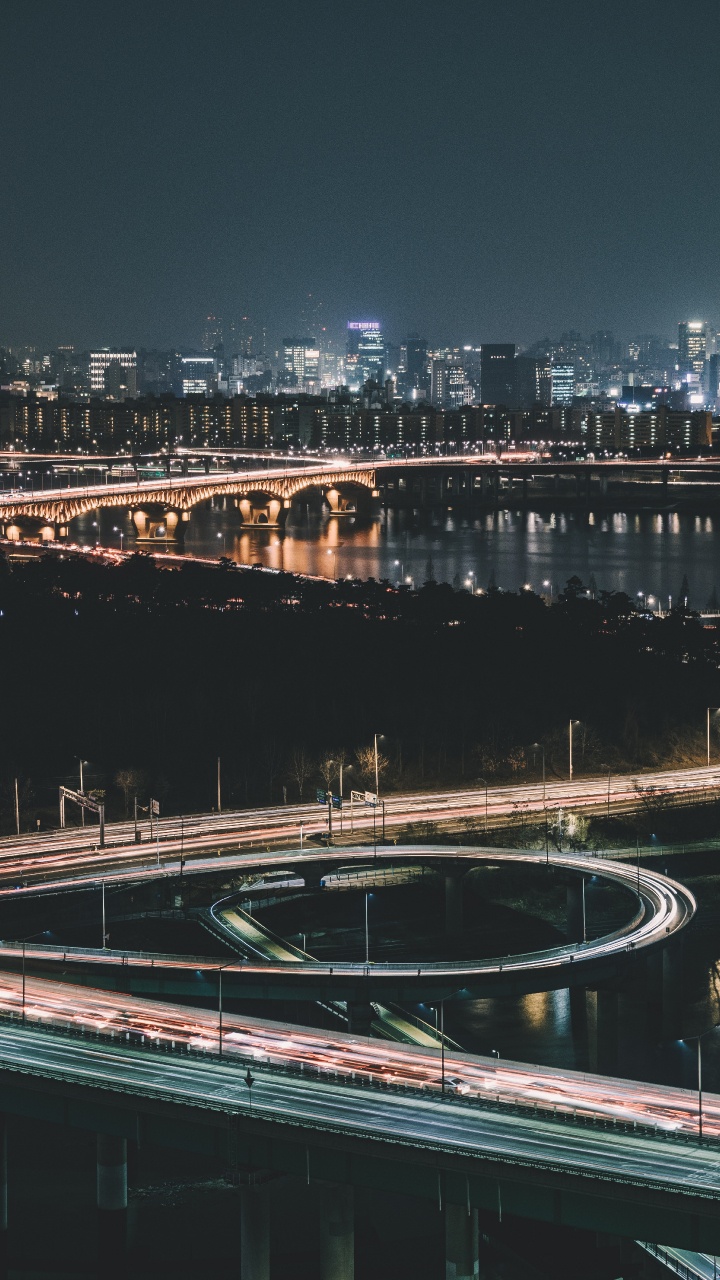 White and Black Bridge Over River During Night Time. Wallpaper in 720x1280 Resolution