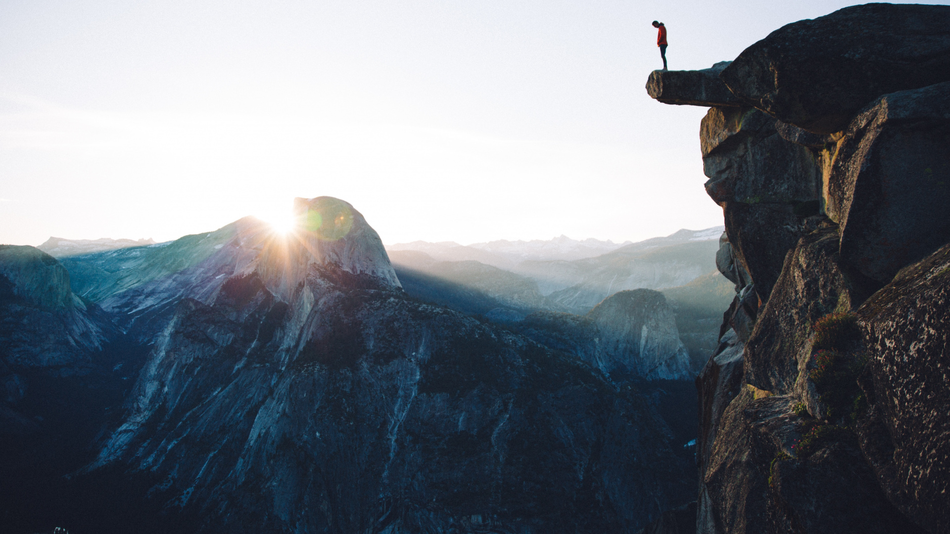 Person Standing on Rock Formation During Daytime. Wallpaper in 1920x1080 Resolution