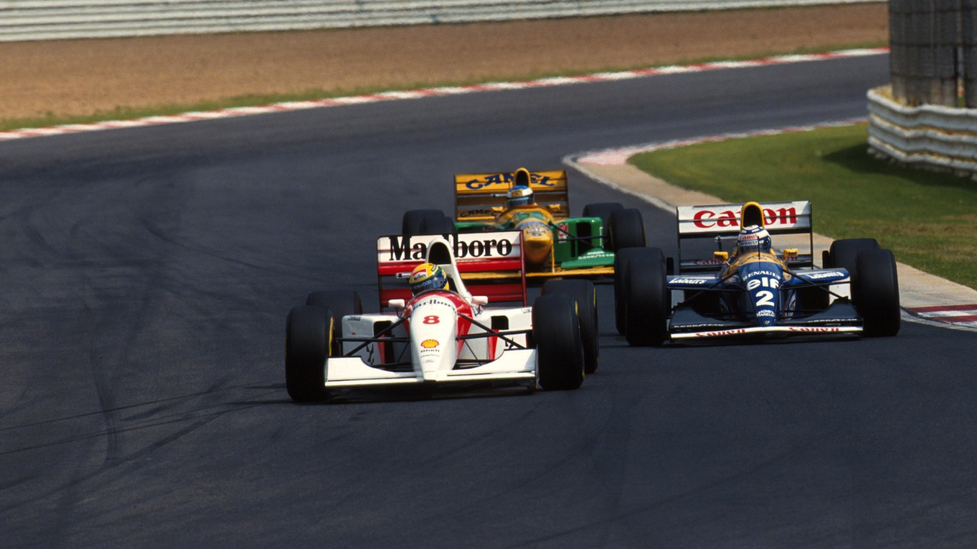 White and Red Formula 1 on Race Track. Wallpaper in 1920x1080 Resolution