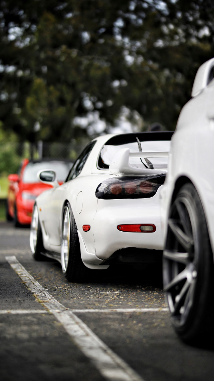 White Porsche 911 Parked on Road During Daytime. Wallpaper in 750x1334 Resolution