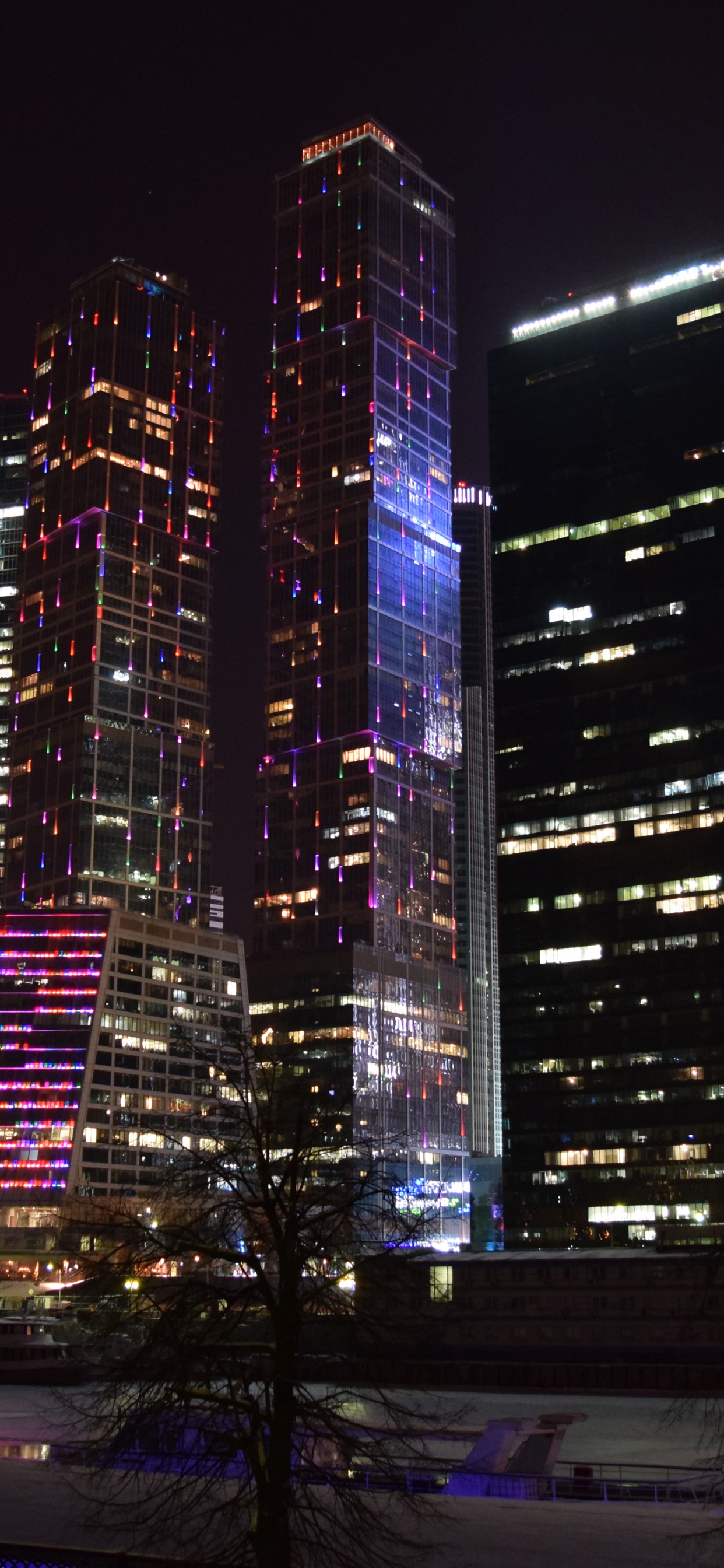 City Buildings During Night Time. Wallpaper in 1242x2688 Resolution