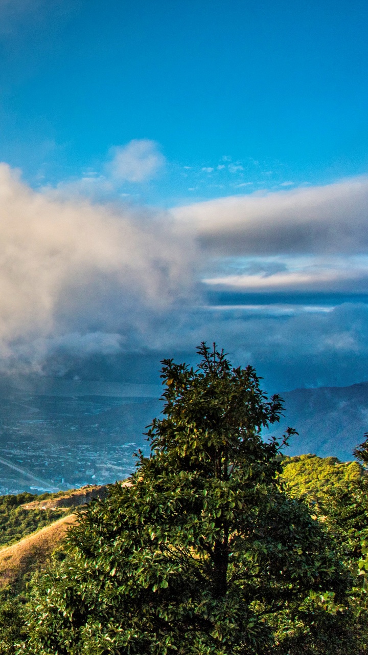 Green Mountain Under White Clouds During Daytime. Wallpaper in 720x1280 Resolution
