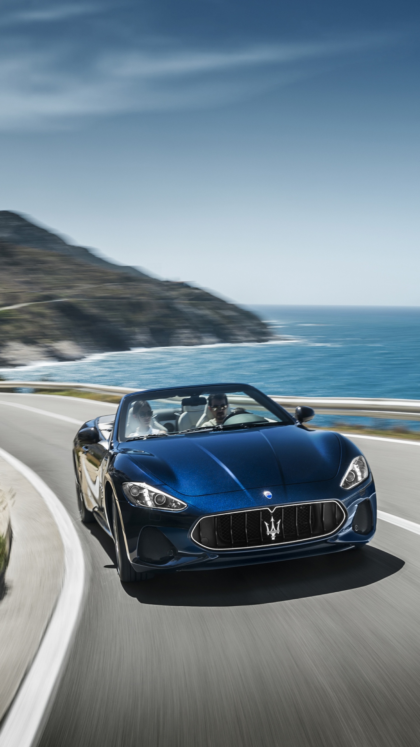 Blue Porsche 911 on Road Near Sea During Daytime. Wallpaper in 1440x2560 Resolution