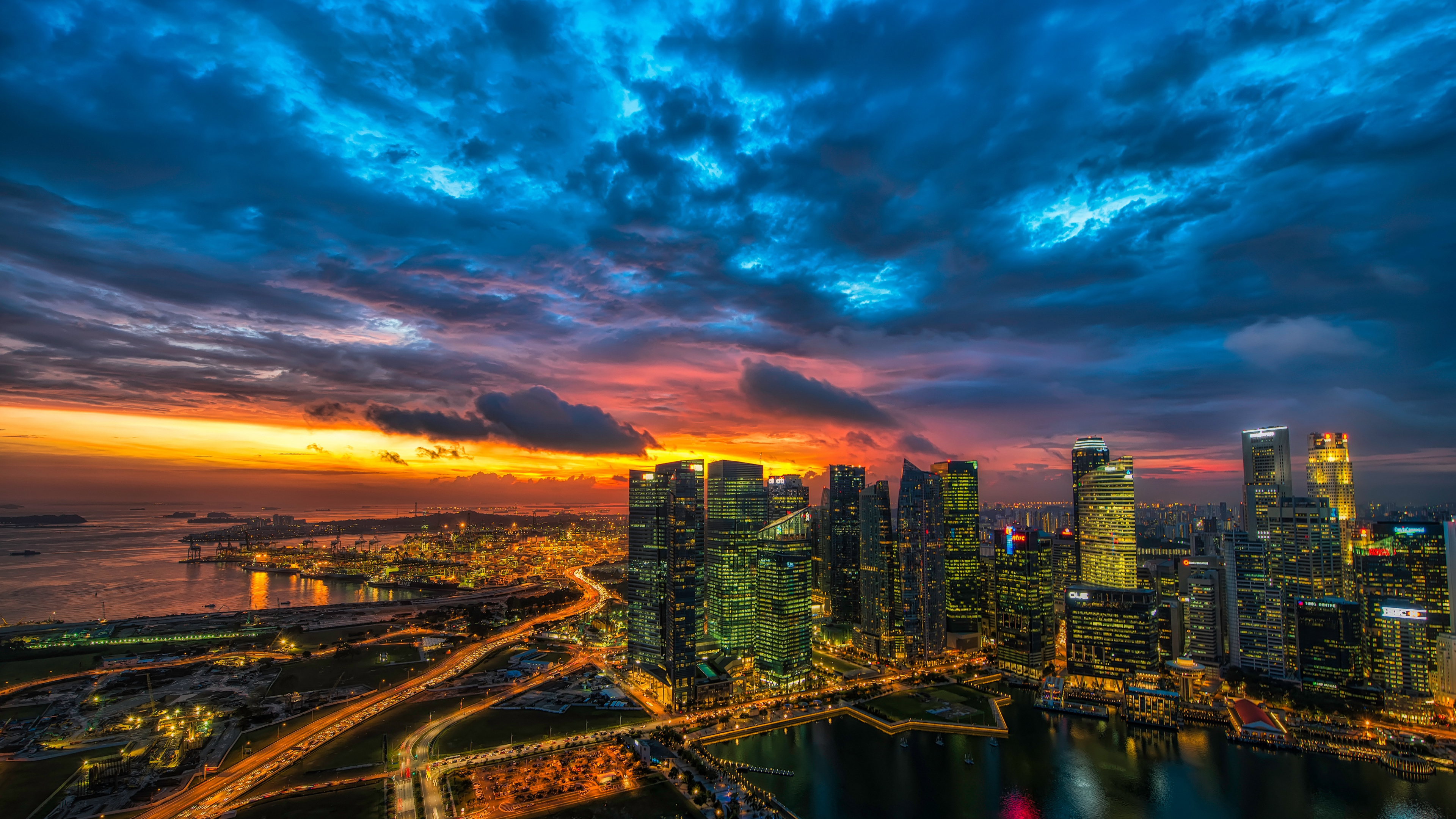 City Skyline Under Blue and Orange Cloudy Sky During Night Time. Wallpaper in 3840x2160 Resolution