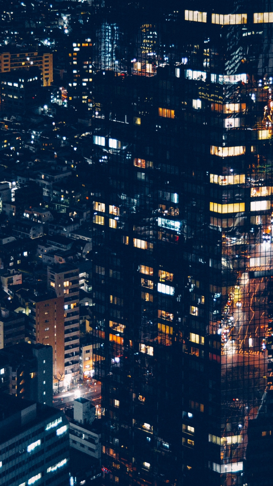 Vue Aérienne Des Bâtiments de la Ville Pendant la Nuit. Wallpaper in 1080x1920 Resolution