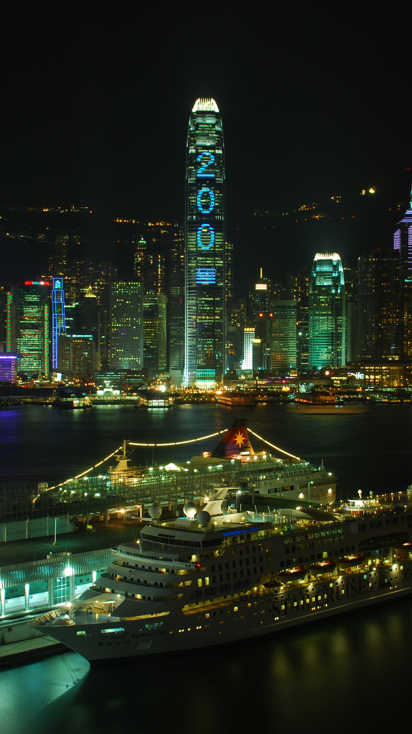 White Cruise Ship on Dock During Night Time. Wallpaper in 1440x2560 Resolution