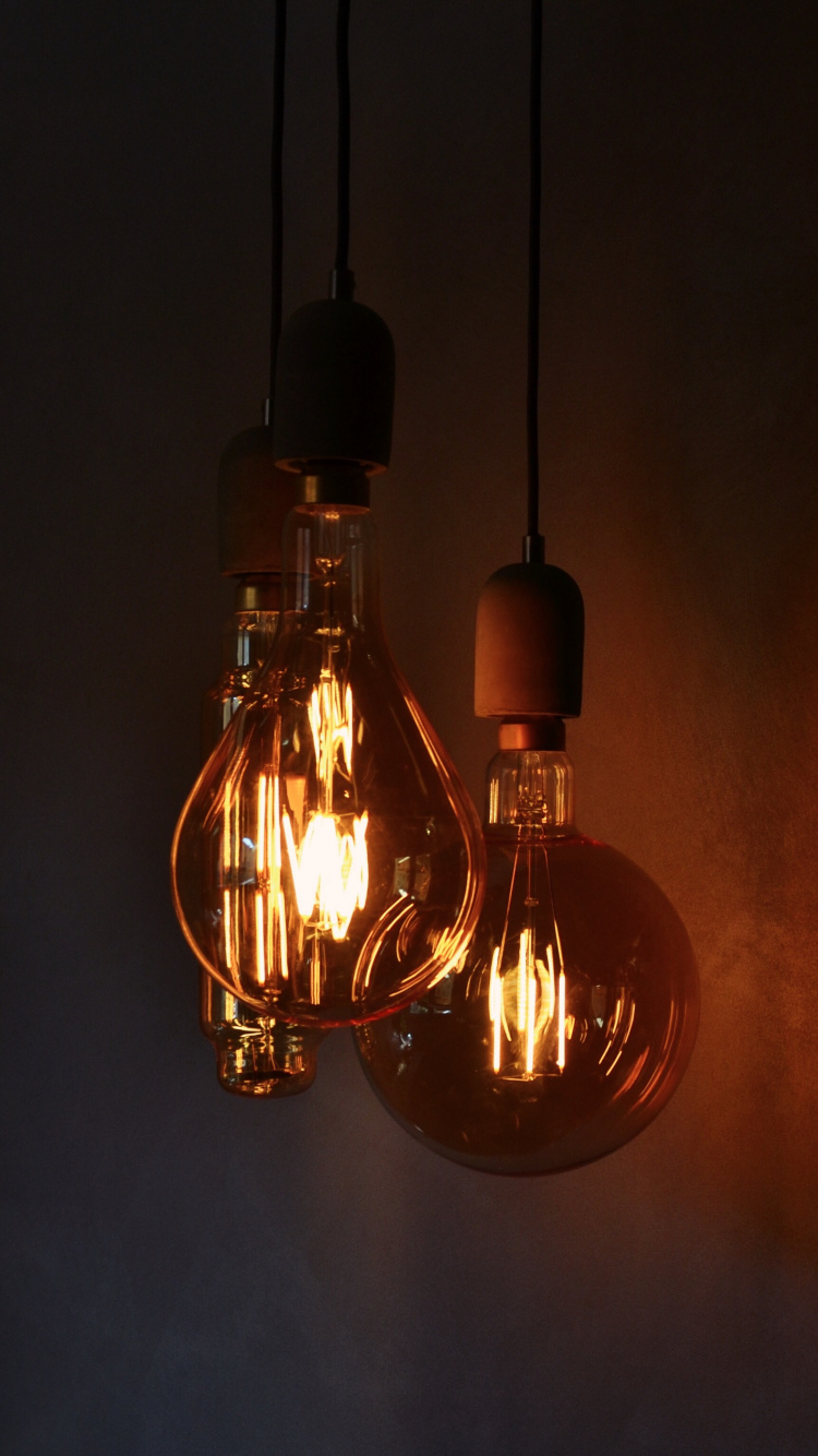 Brown and Yellow Light Bulb. Wallpaper in 750x1334 Resolution
