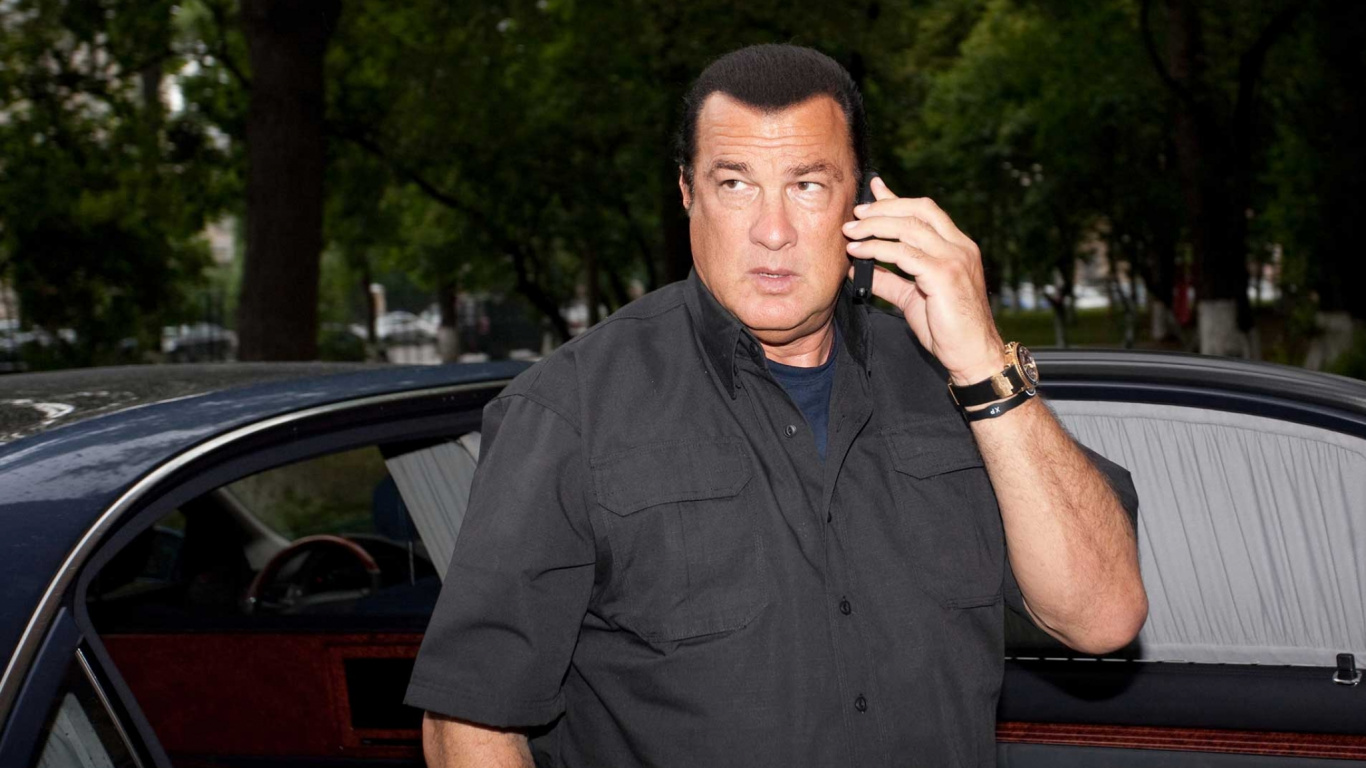 Man in Black Button up Shirt Standing Near Red Car During Daytime. Wallpaper in 1366x768 Resolution