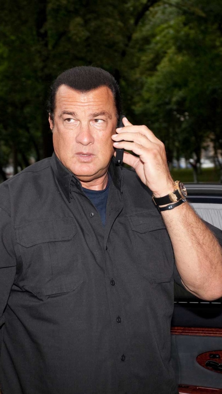 Man in Black Button up Shirt Standing Near Red Car During Daytime. Wallpaper in 720x1280 Resolution