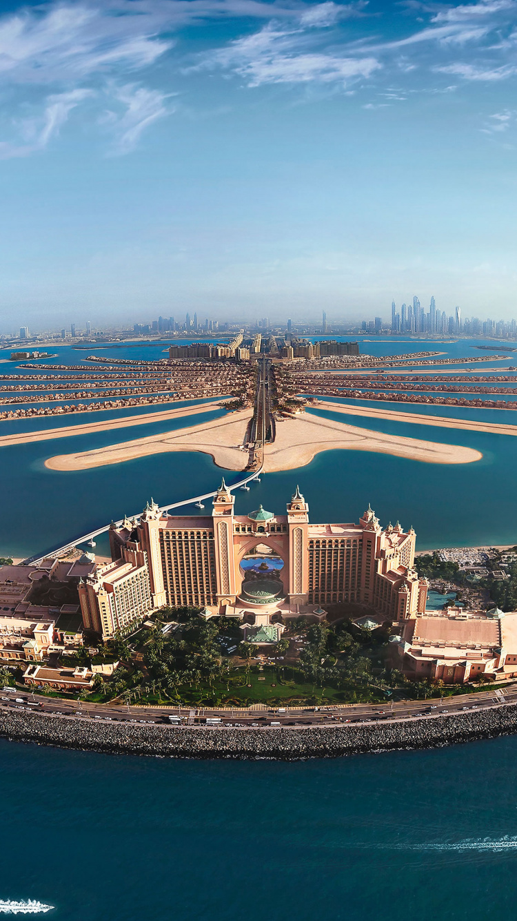 Vue Aérienne Des Bâtiments de la Ville Près du Plan D'eau Pendant la Journée. Wallpaper in 750x1334 Resolution