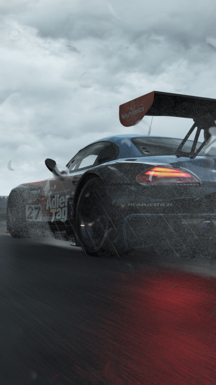 Voiture de Sport Noire et Rouge Sur Route Pendant la Journée. Wallpaper in 750x1334 Resolution