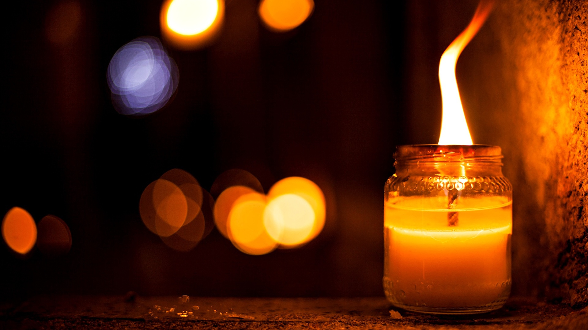 Lighted Candle in Clear Glass Container. Wallpaper in 1920x1080 Resolution