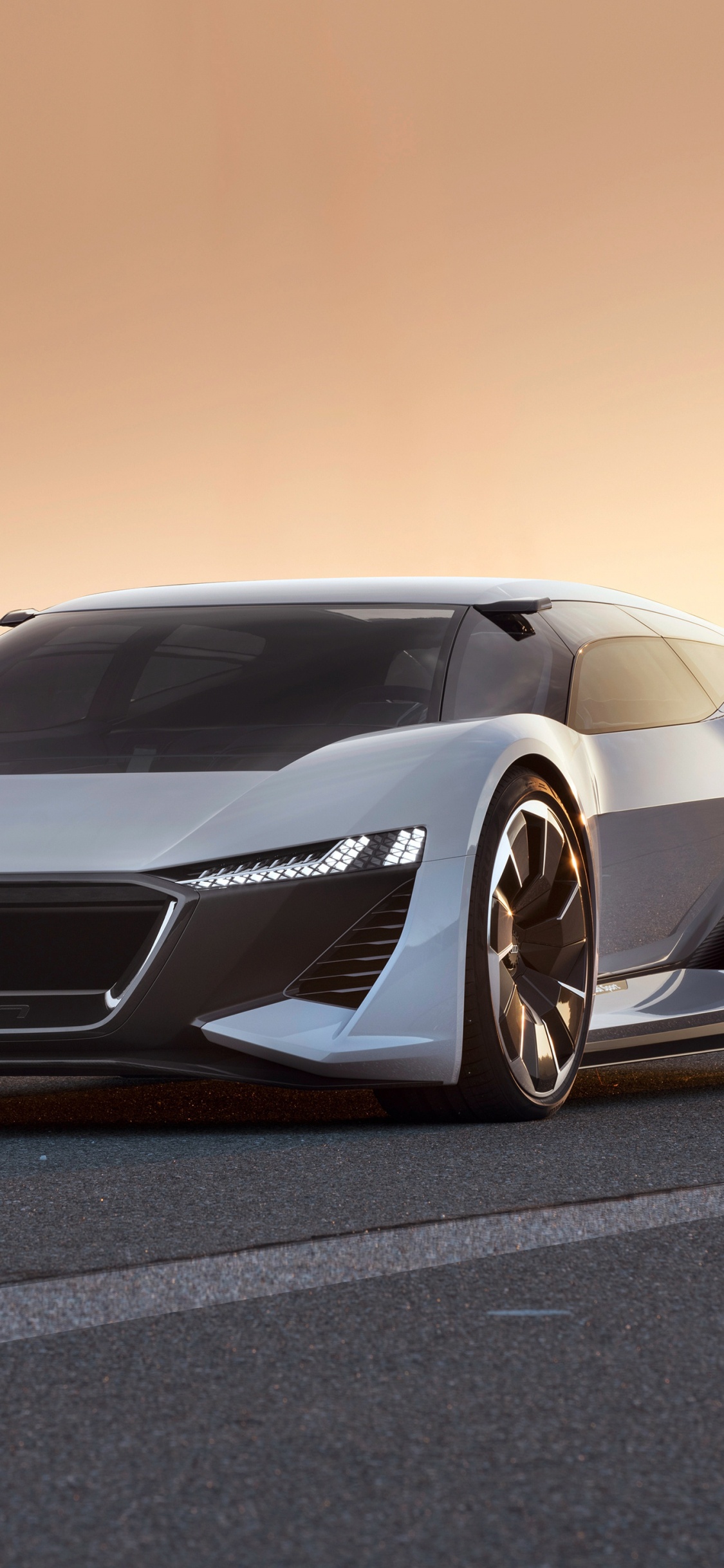 Silver Porsche 911 on Road During Sunset. Wallpaper in 1125x2436 Resolution