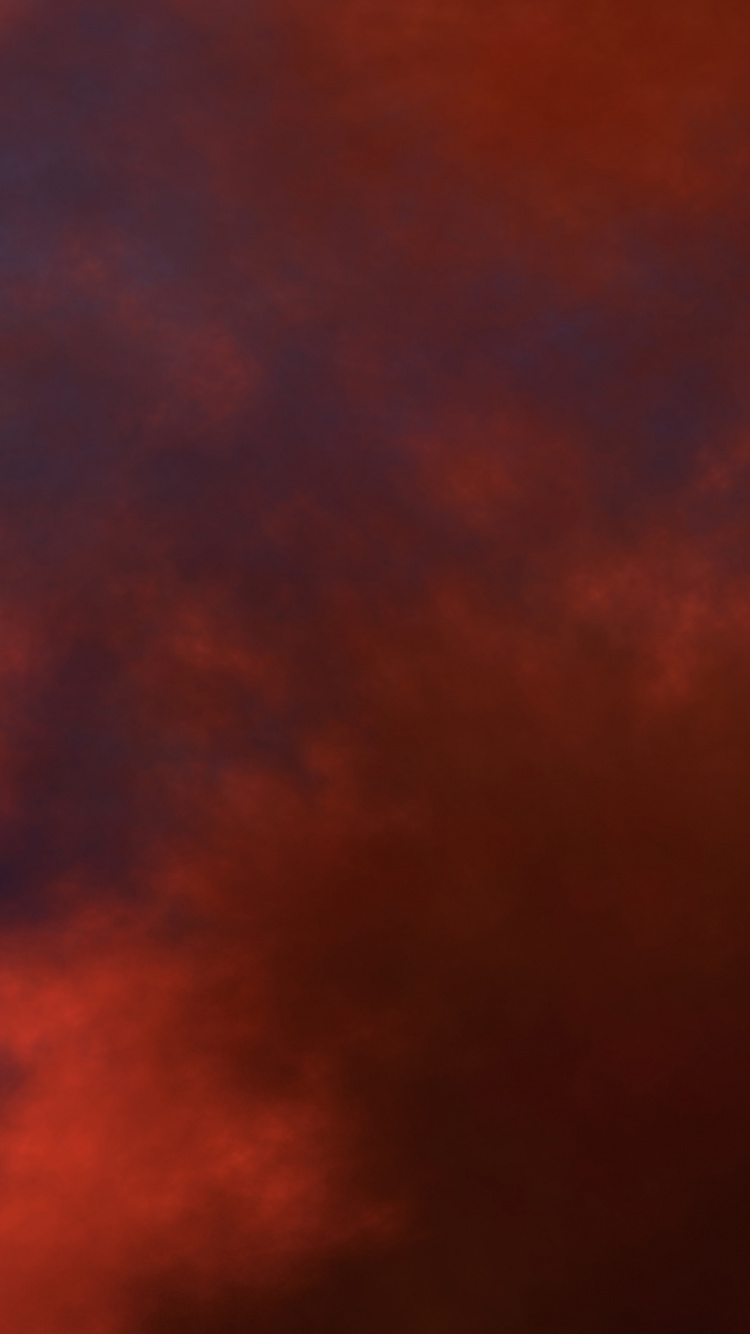 Rote Und Schwarze Wolken Während Der Nacht. Wallpaper in 750x1334 Resolution