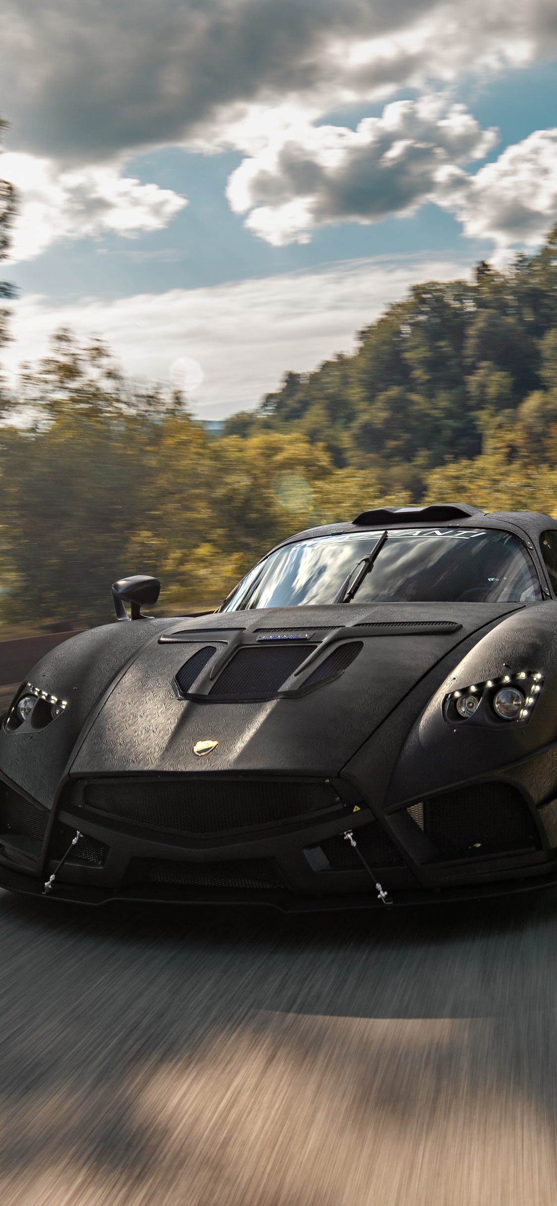 Black Porsche 911 on Road During Daytime. Wallpaper in 1125x2436 Resolution