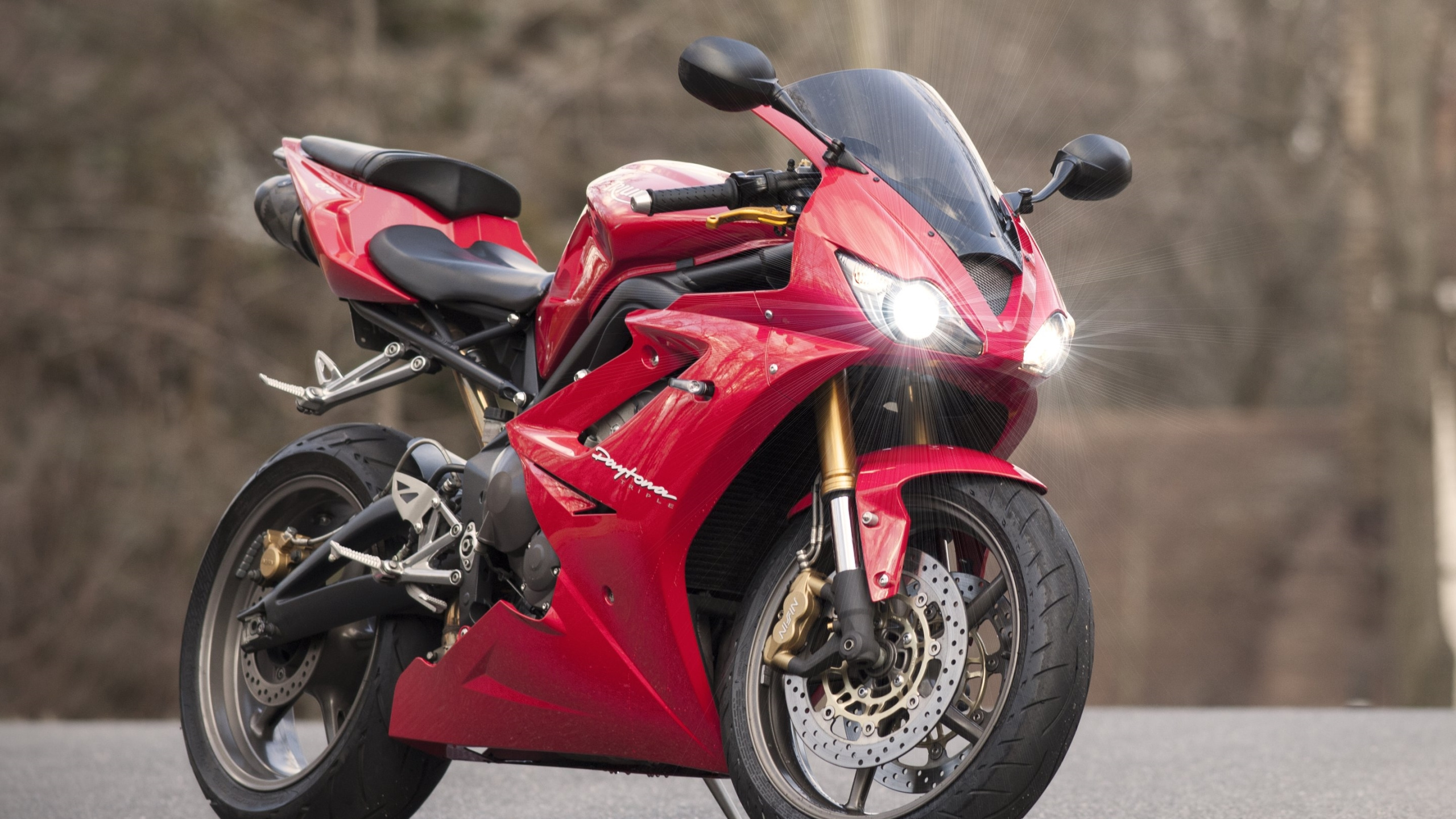 Red and Black Sports Bike. Wallpaper in 2560x1440 Resolution