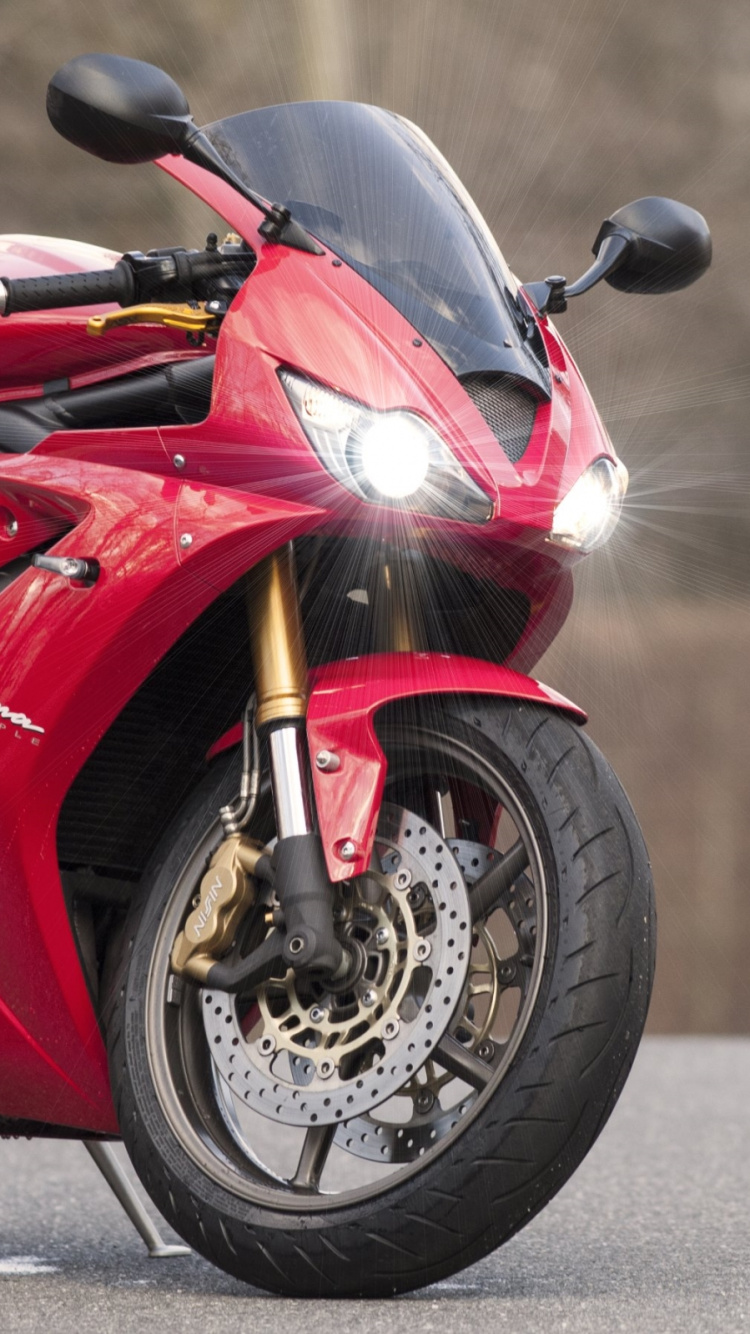 Red and Black Sports Bike. Wallpaper in 750x1334 Resolution