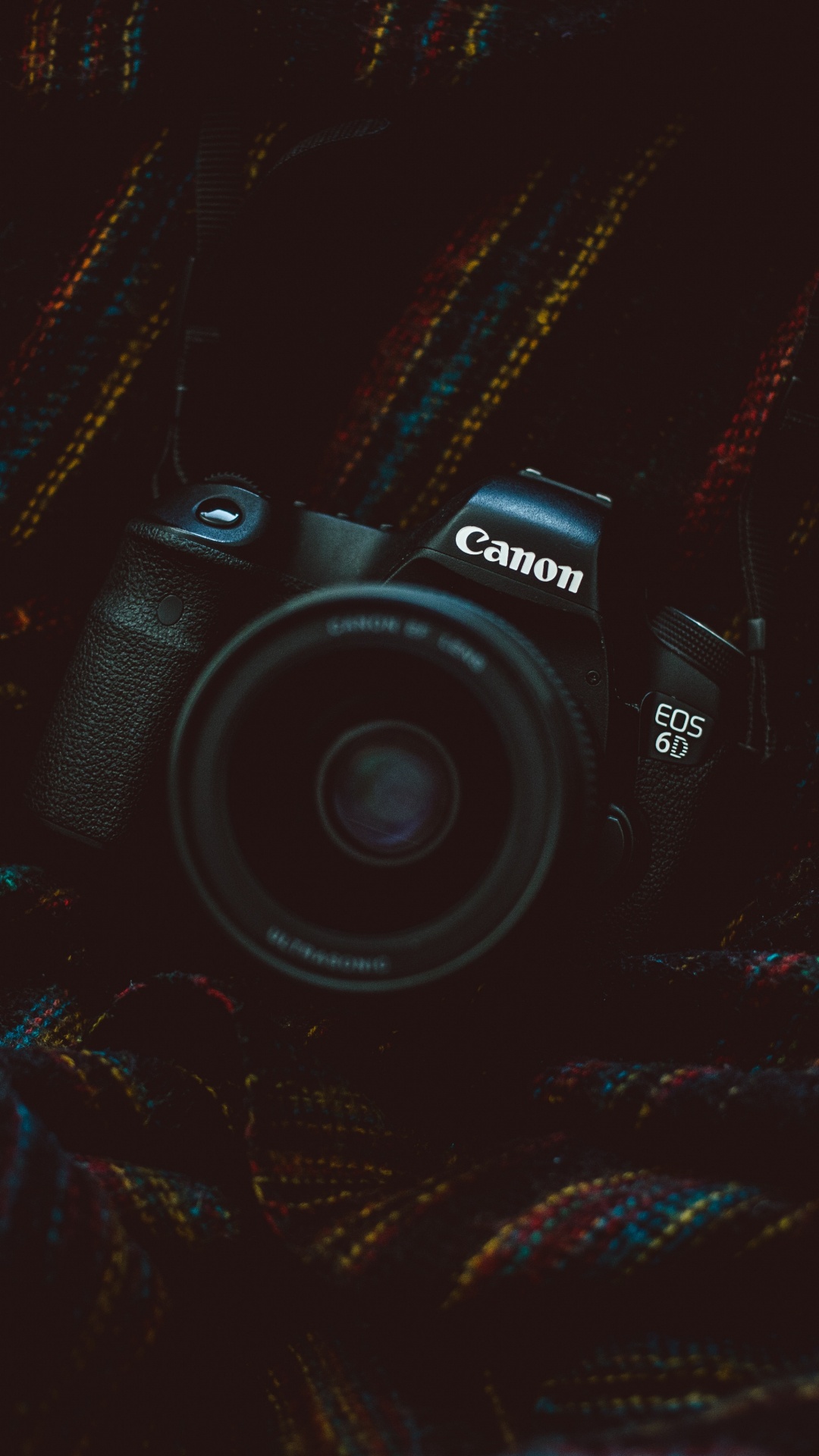 Black Nikon Dslr Camera on Black and Brown Textile. Wallpaper in 1080x1920 Resolution