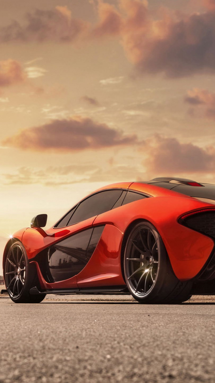 Red Ferrari 458 Italia on Road During Daytime. Wallpaper in 750x1334 Resolution