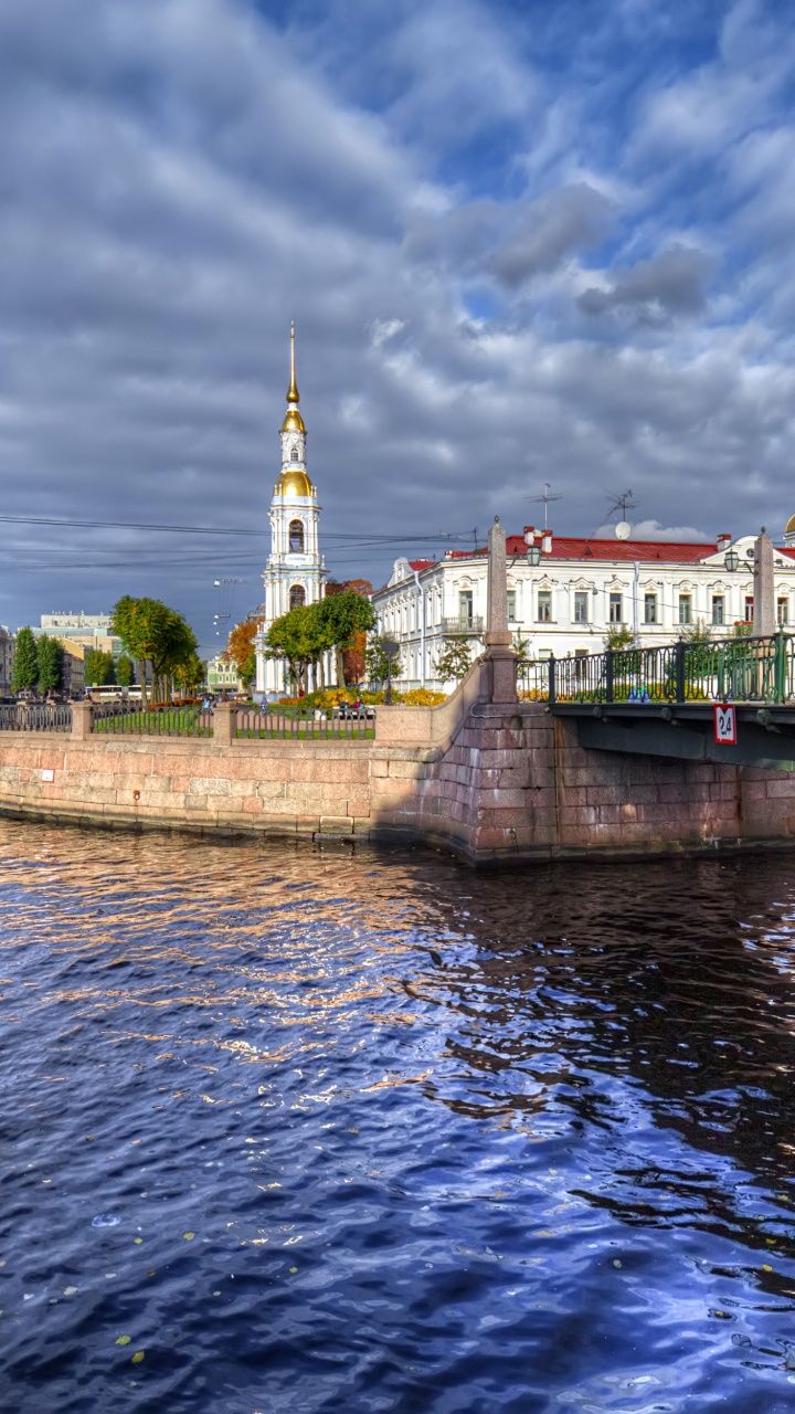 Body of Water Near Green Trees Under Blue Sky During Daytime. Wallpaper in 720x1280 Resolution