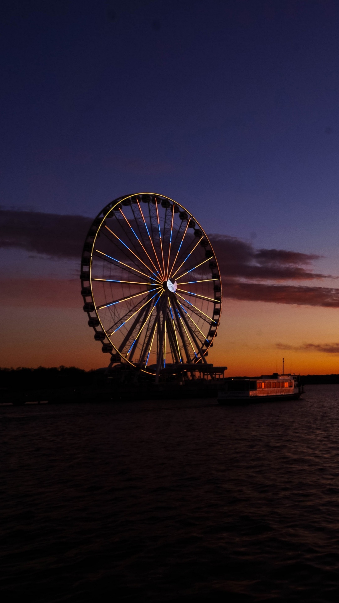 Silhouette de Grande Roue Pendant le Coucher du Soleil. Wallpaper in 1080x1920 Resolution