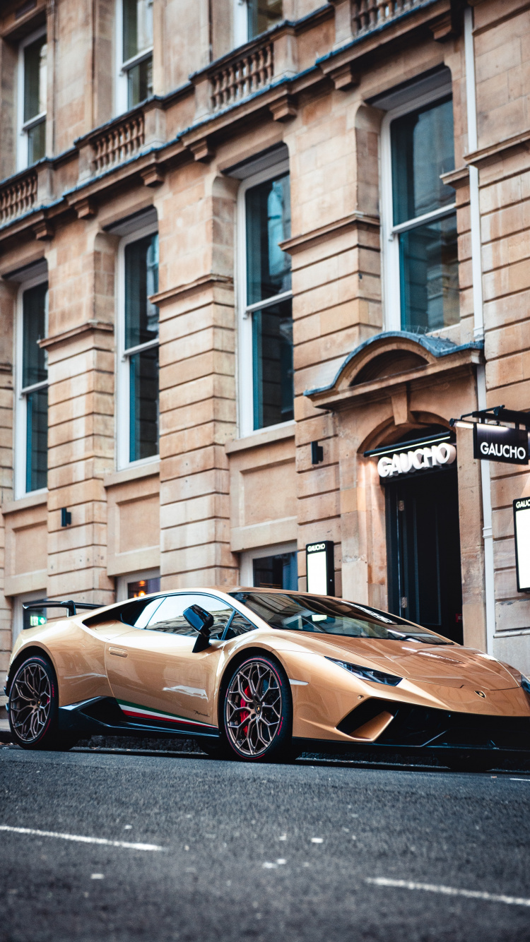 Brauner Porsche 911 Tagsüber Neben Braunem Betongebäude Geparkt. Wallpaper in 750x1334 Resolution