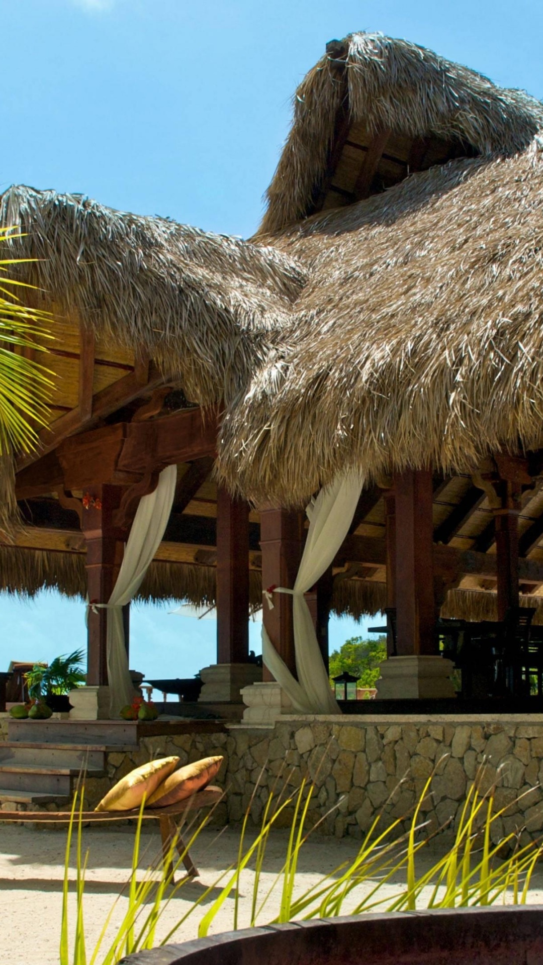 Brown Wooden Gazebo Near Palm Tree During Daytime. Wallpaper in 1080x1920 Resolution