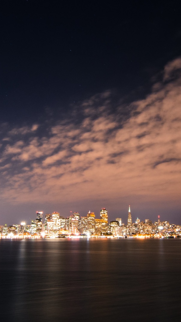 City Lights on Body of Water During Night Time. Wallpaper in 720x1280 Resolution