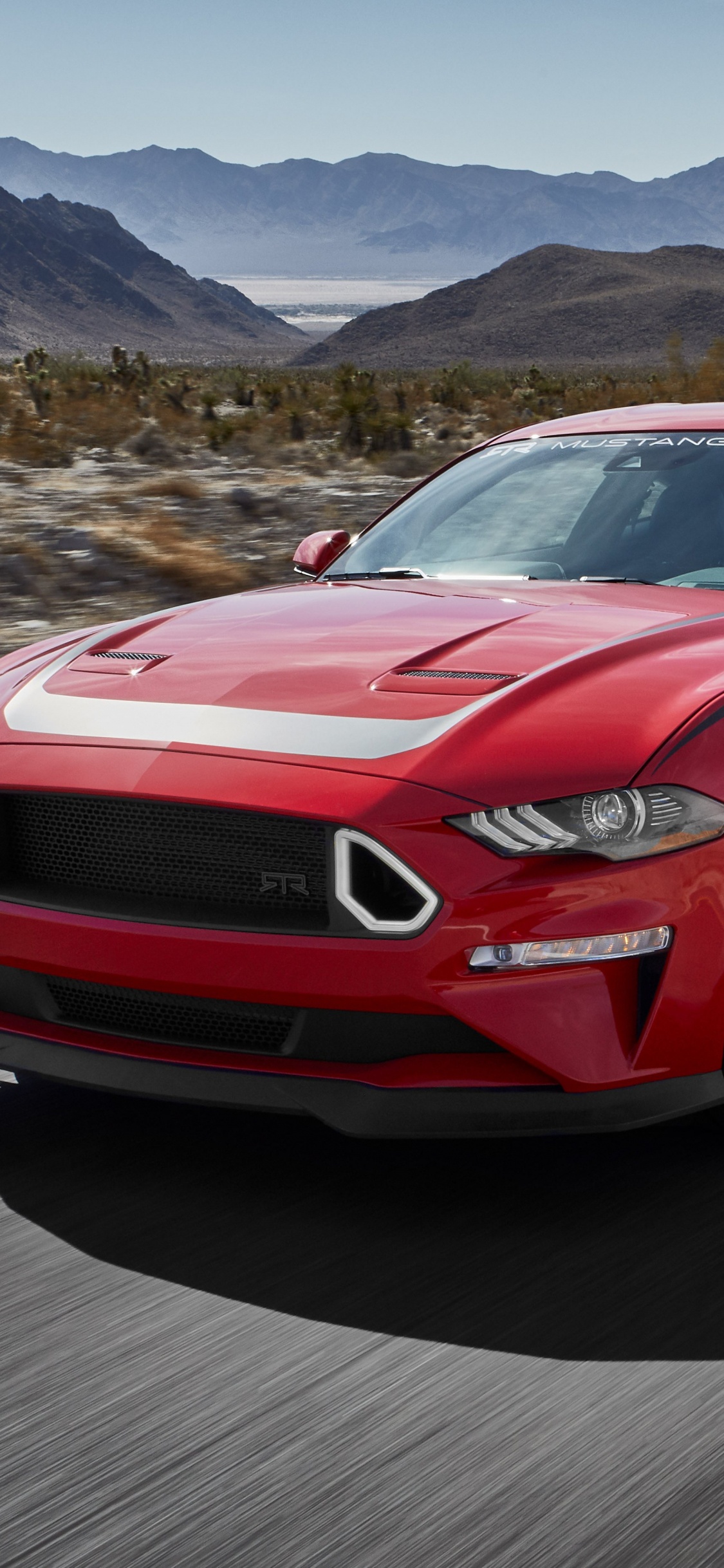 Bmw m 3 Rojo en la Carretera Durante el Día. Wallpaper in 1125x2436 Resolution