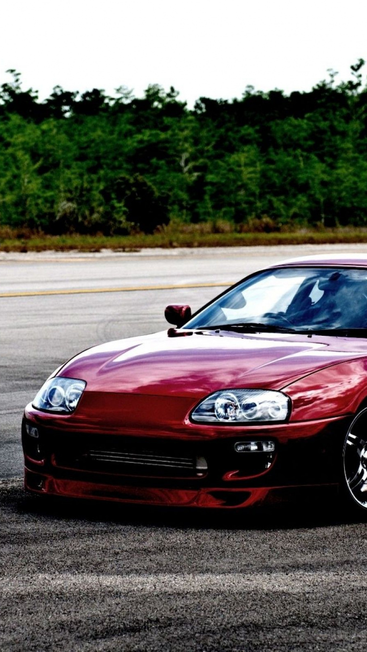 Roter Porsche 911 Tagsüber Unterwegs. Wallpaper in 750x1334 Resolution