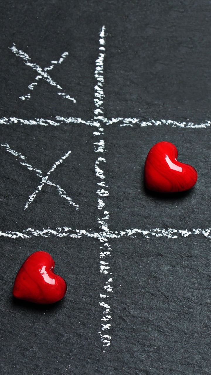 Ornement en Forme de Coeur Rouge Sur Textile Gris. Wallpaper in 720x1280 Resolution