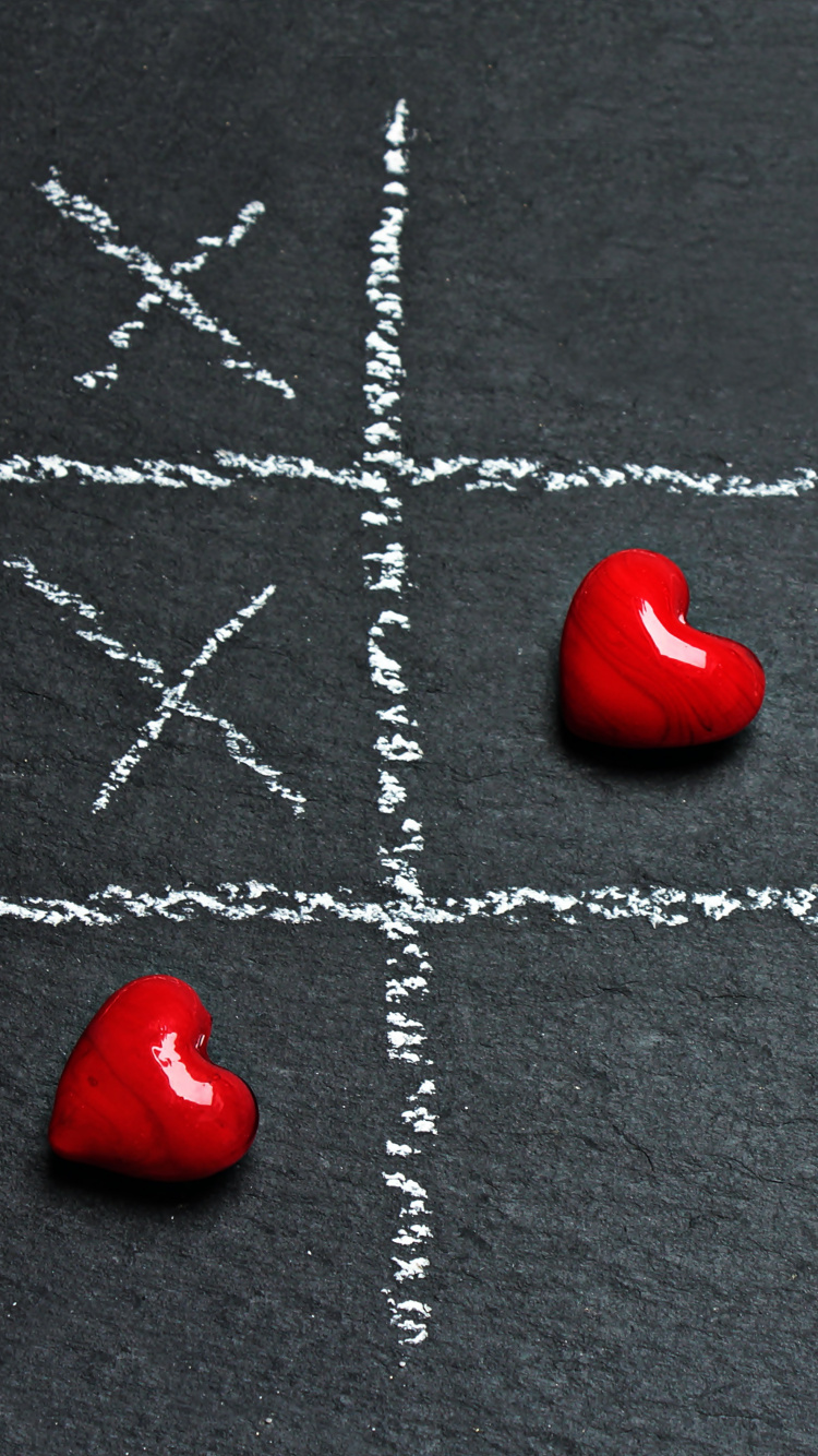 Adorno en Forma de Corazón Rojo Sobre Textil Gris. Wallpaper in 750x1334 Resolution