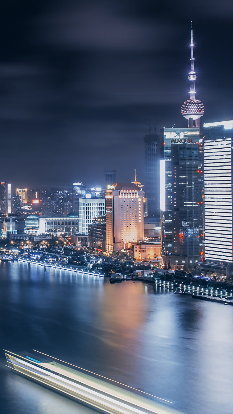 City Skyline During Night Time. Wallpaper in 750x1334 Resolution