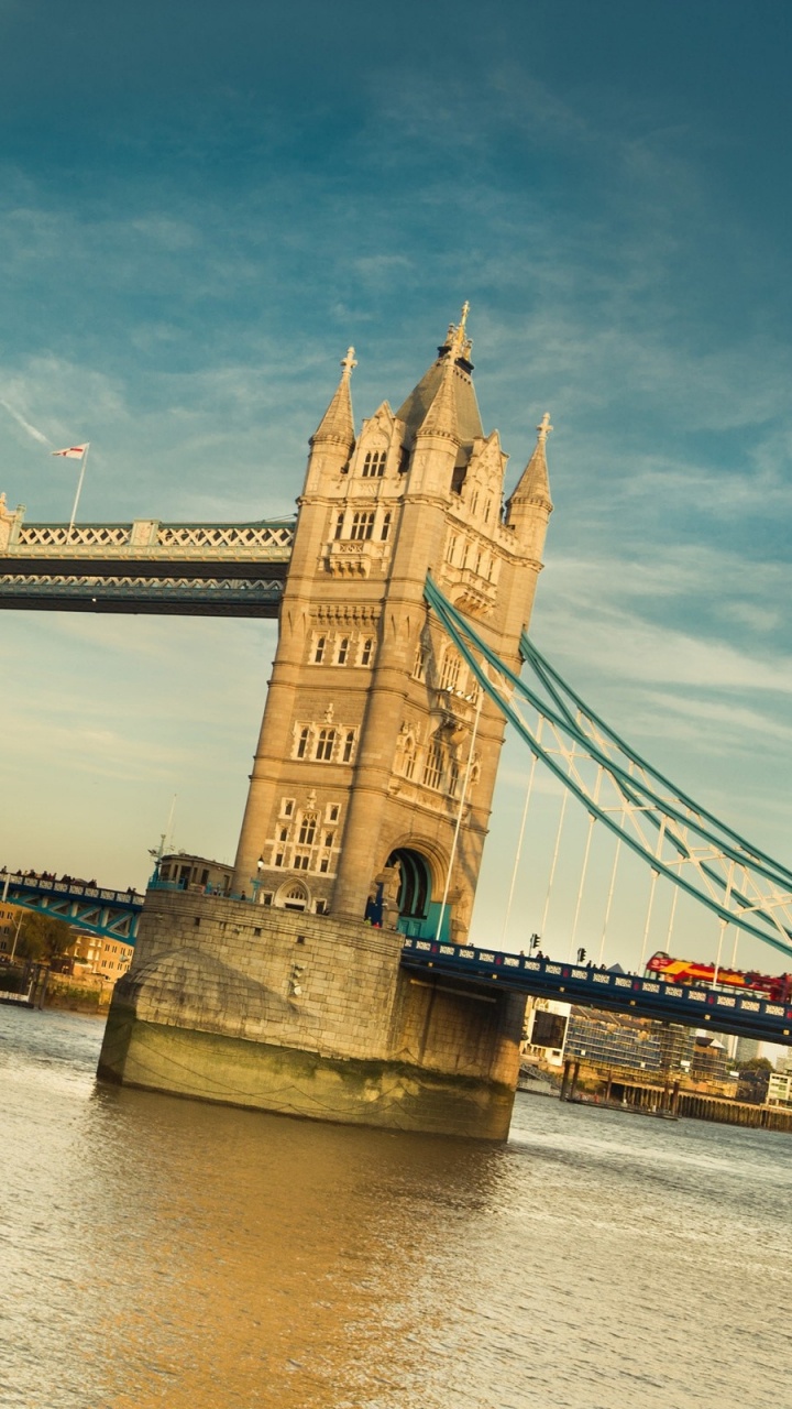 Brown Concrete Bridge Under Blue Sky During Daytime. Wallpaper in 720x1280 Resolution