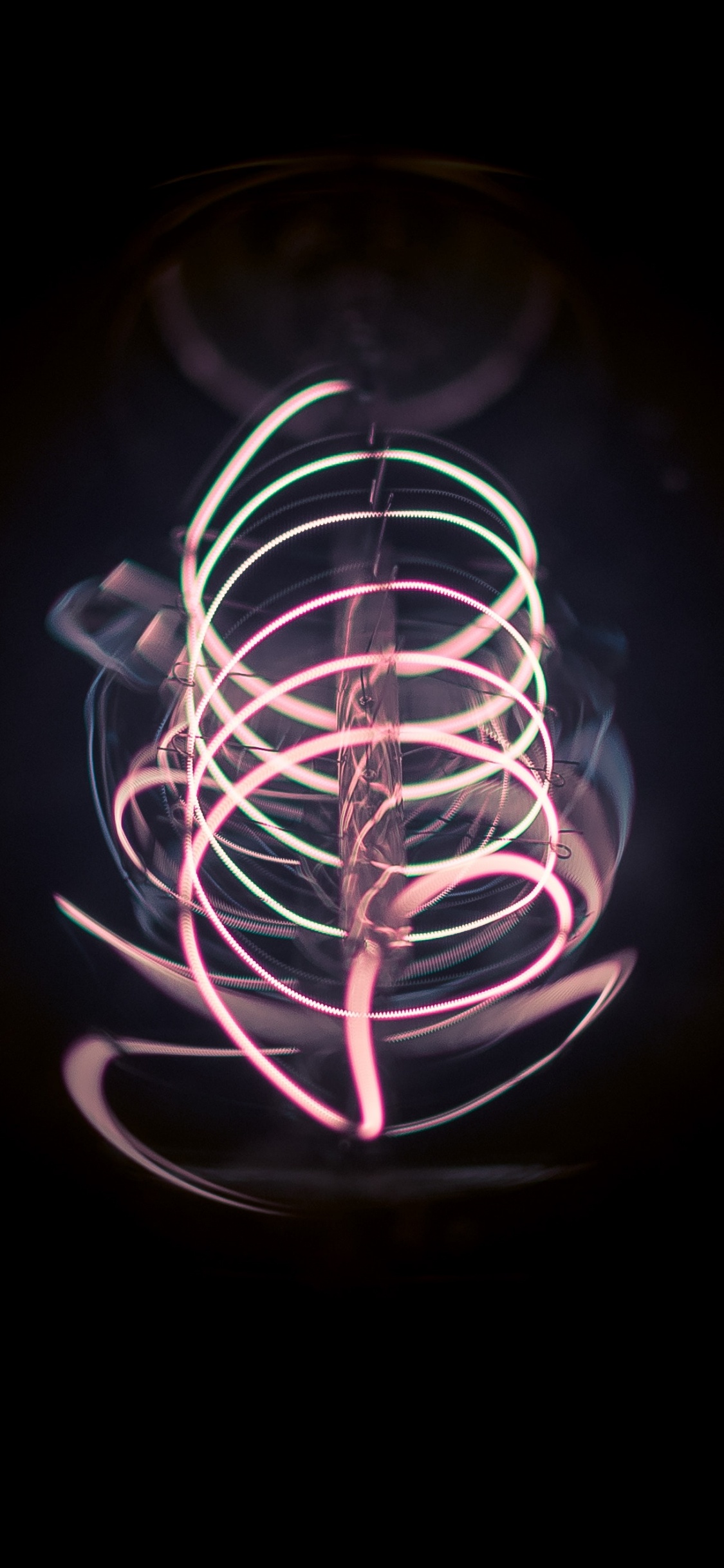 Weißes Und Schwarzes Rundes Licht. Wallpaper in 1125x2436 Resolution