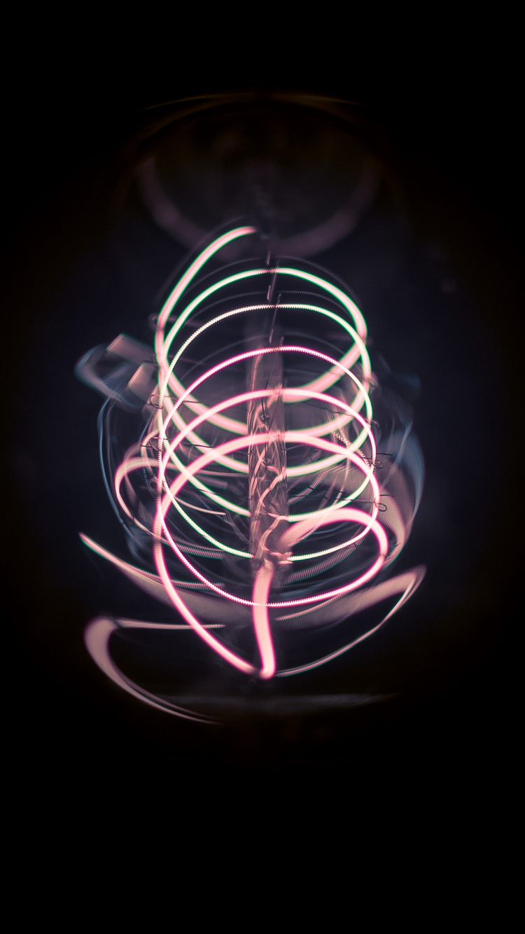 Weißes Und Schwarzes Rundes Licht. Wallpaper in 750x1334 Resolution