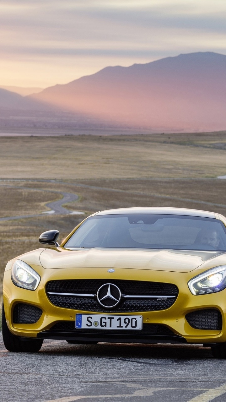 Yellow Mercedes Benz Car on Road During Daytime. Wallpaper in 720x1280 Resolution