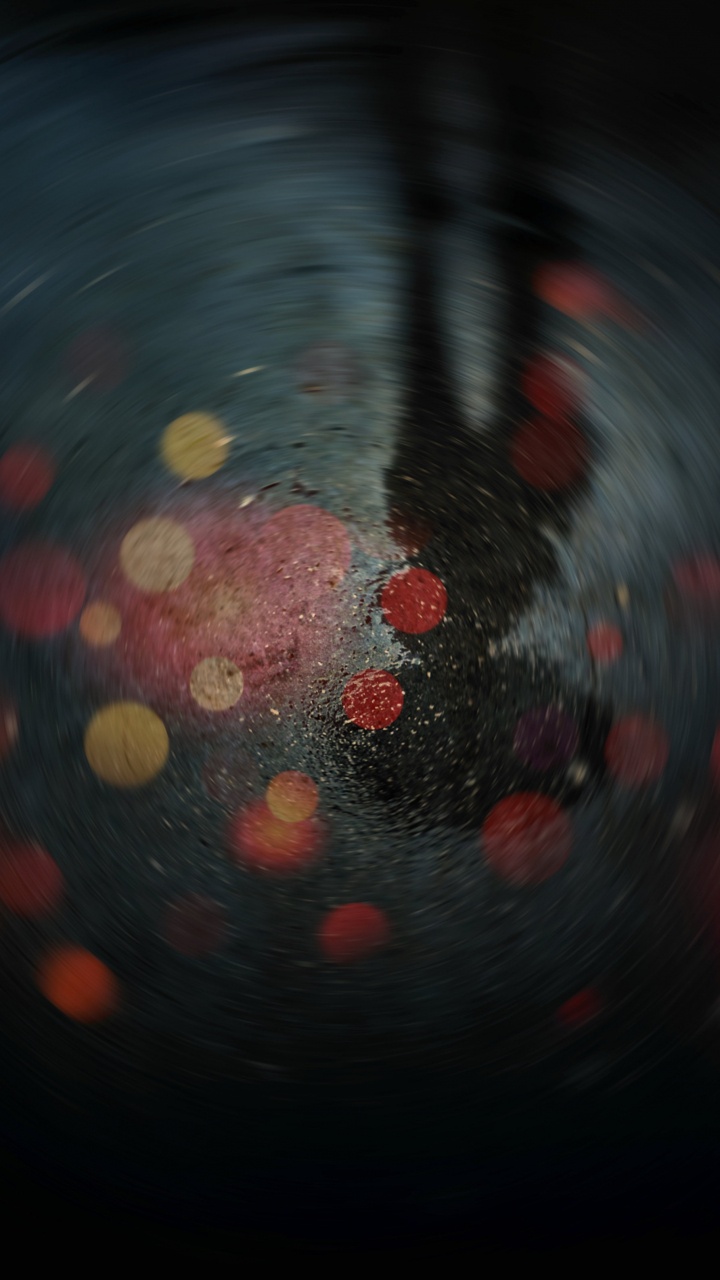 Luz Roja y Amarilla Sobre Superficie Negra.. Wallpaper in 720x1280 Resolution