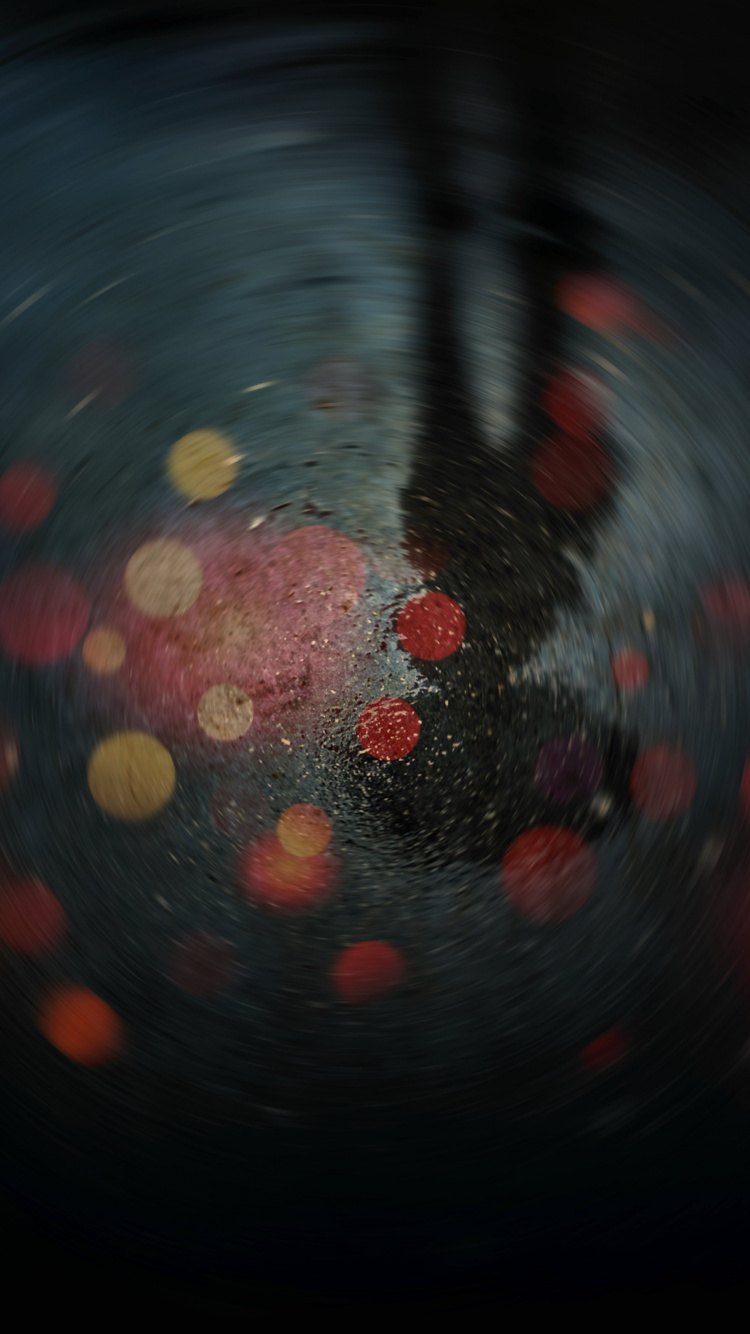 Red and Yellow Light on Black Surface. Wallpaper in 750x1334 Resolution