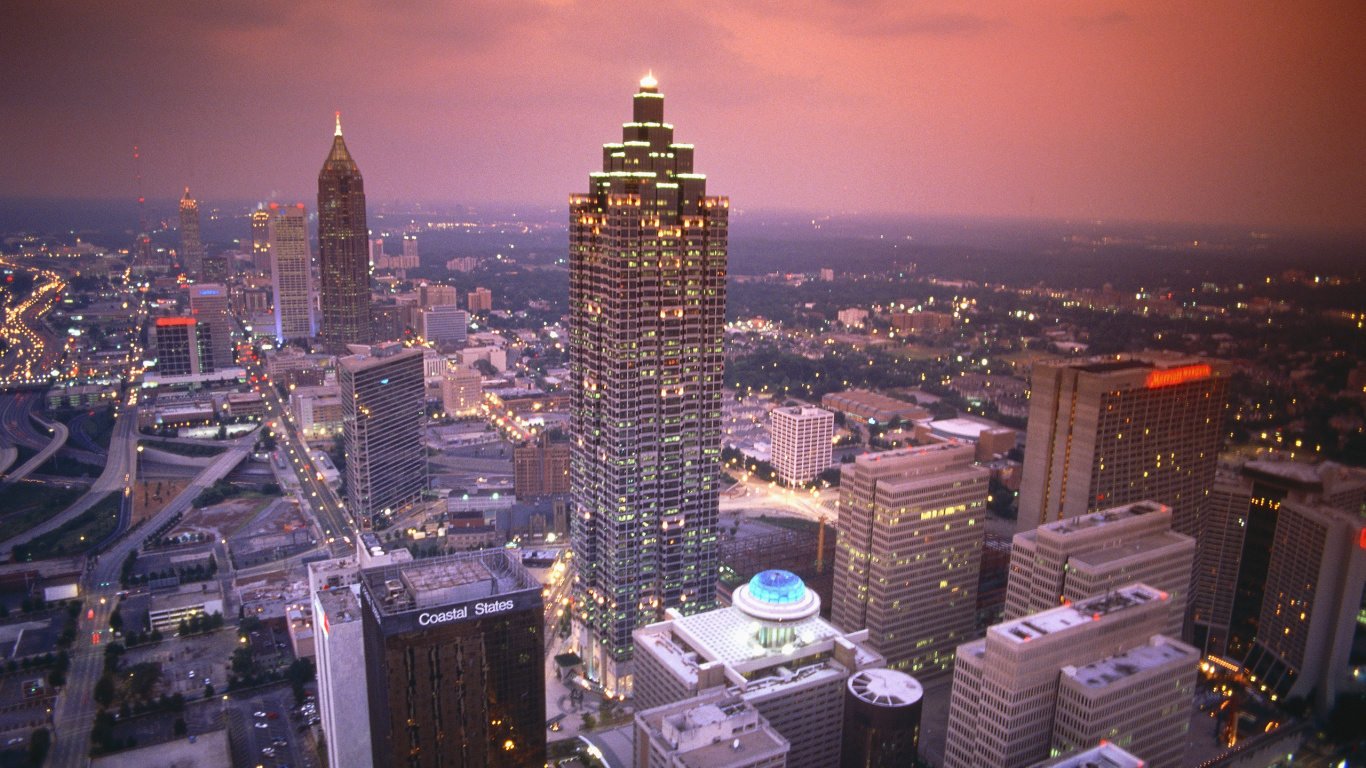 Aerial View of City Buildings During Night Time. Wallpaper in 1366x768 Resolution