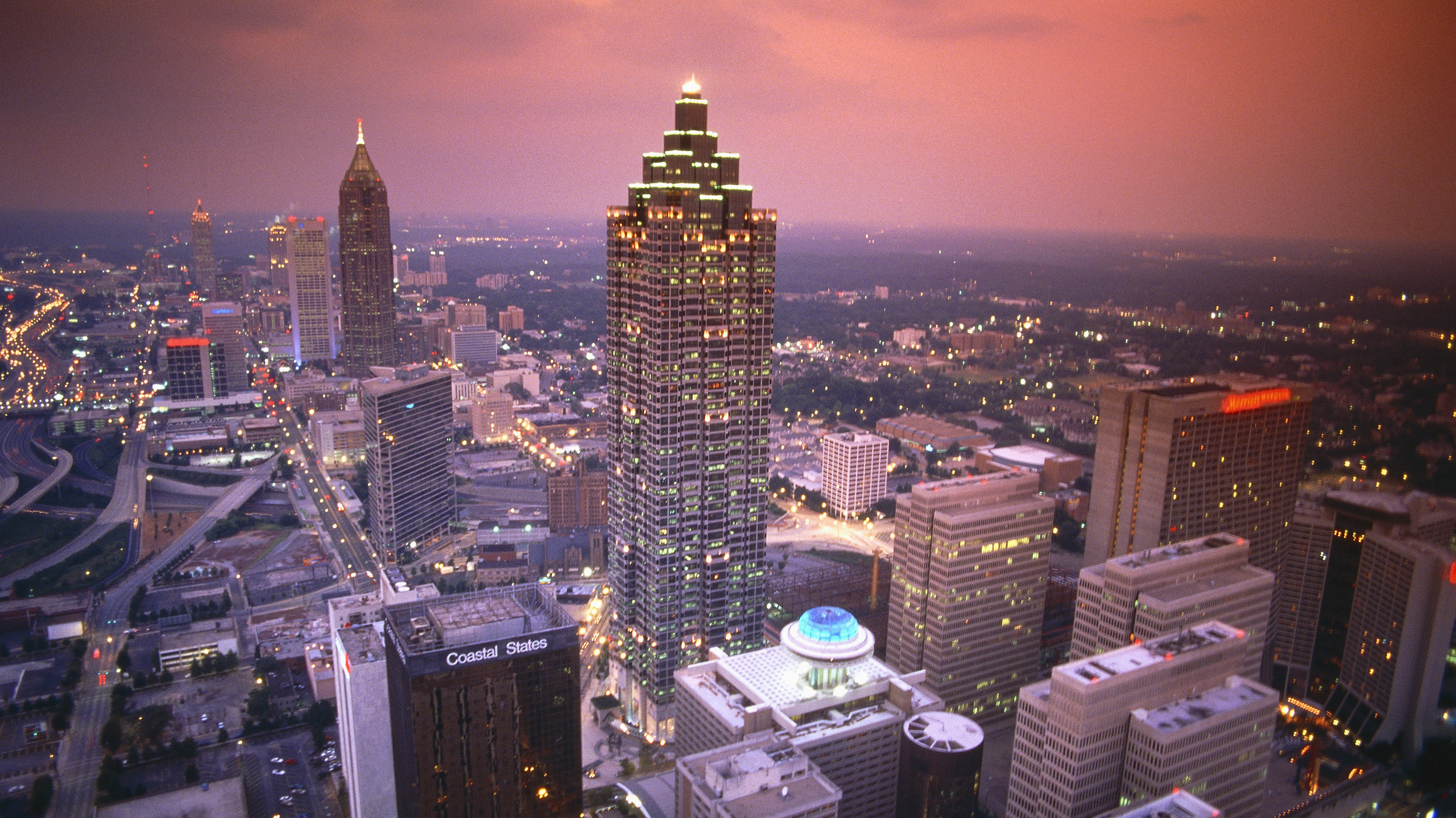 Aerial View of City Buildings During Night Time. Wallpaper in 2560x1440 Resolution