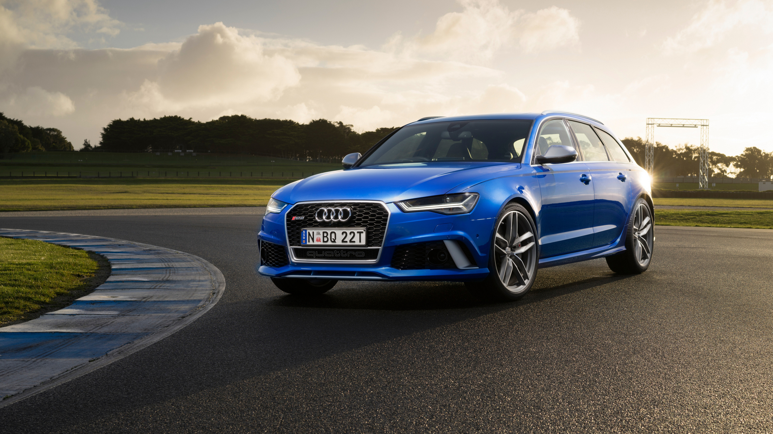 Blue Audi a 4 on Road During Daytime. Wallpaper in 2560x1440 Resolution