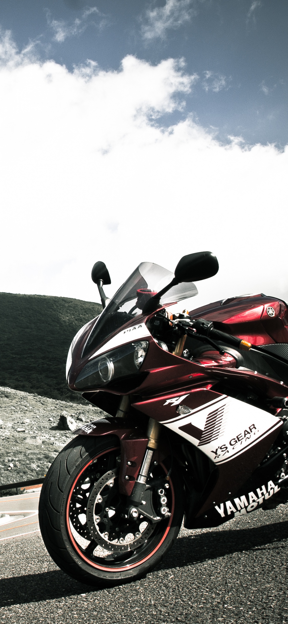 Red and Black Sports Bike on Road During Daytime. Wallpaper in 1125x2436 Resolution