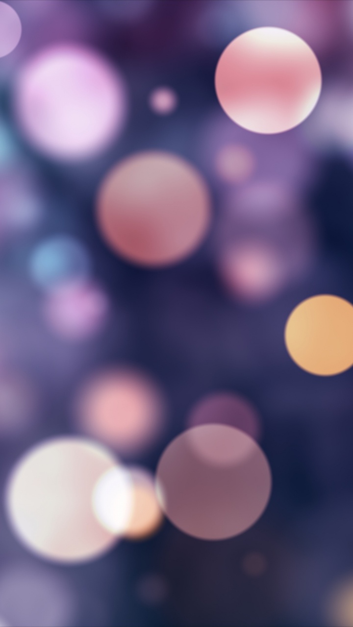 Blue and Yellow Bokeh Lights. Wallpaper in 720x1280 Resolution