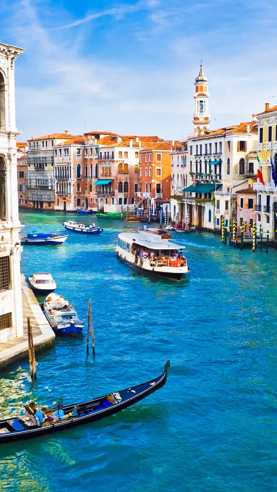 Blue and White Boat on River Between Buildings During Daytime. Wallpaper in 1080x1920 Resolution