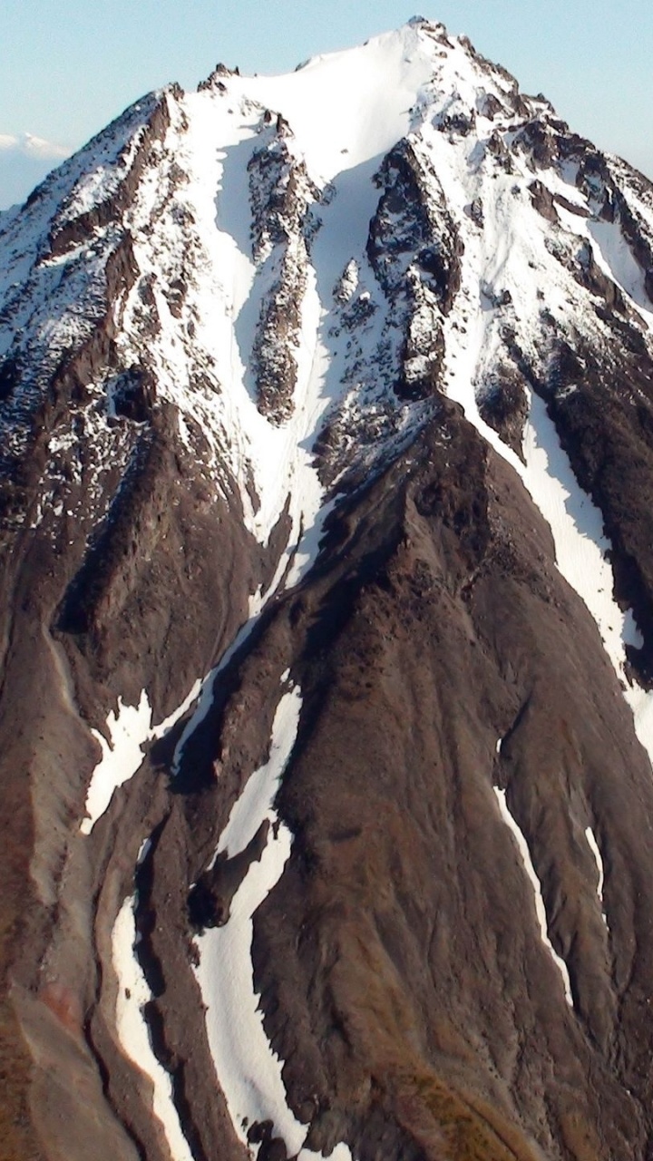 Brown and White Mountain Under Blue Sky During Daytime. Wallpaper in 720x1280 Resolution